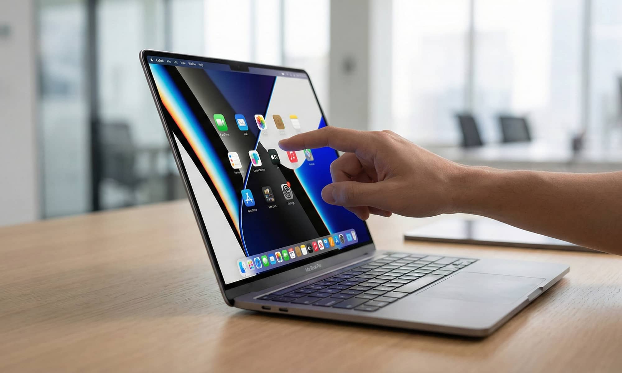 苹果提前「揭晓」触屏 MacBook Pro，我终于能戳同事电脑了_长春APP开发